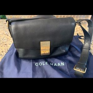 Cole Haan satin finish black leather crossbody bag.